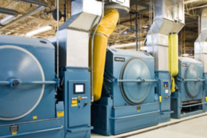 Energy-efficient industrial dryer with features that improve drying efficiency